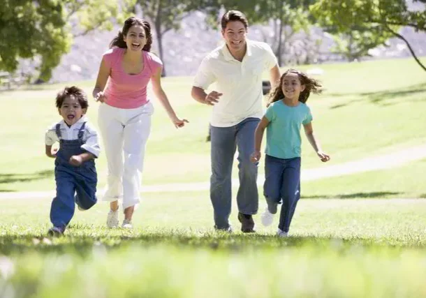 family-running-outdoors-smiling-SBI-301053584-1731837